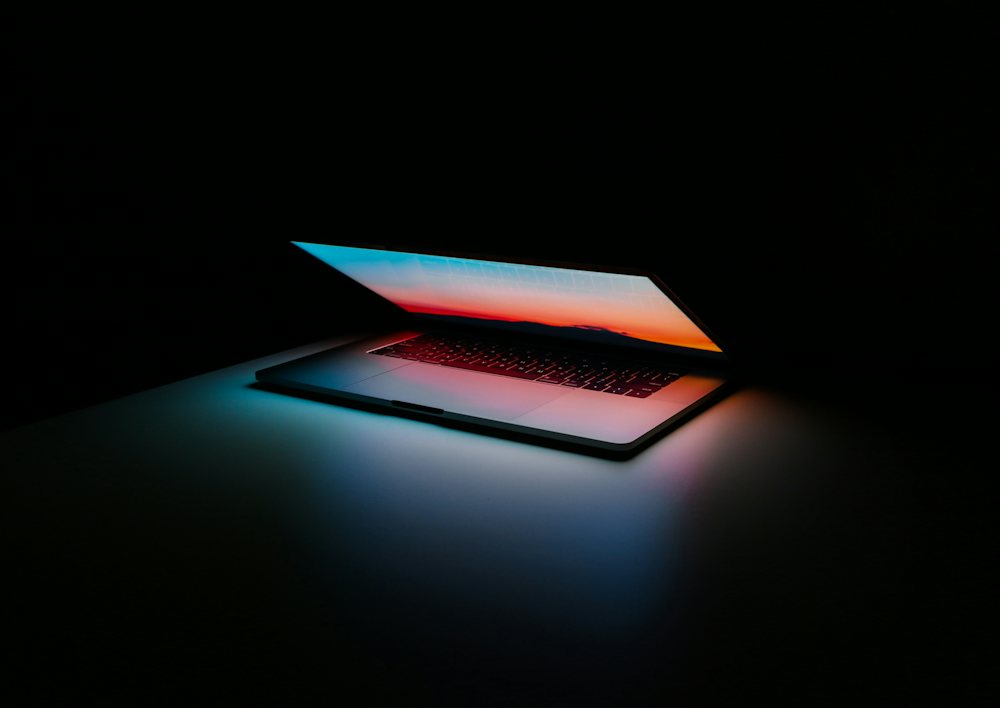 Laptop glowing in the dark